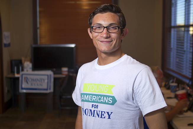 Dorian Achaval, 17, a volunteer for the Mitt Romney for President campaign, poses in a Henderson field office Monday, Nov. 5, 2012.