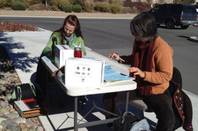 Workers tabulate exit polls in Carson City outside the fairgrounds. on Tueday, Nov. 6, 2012.