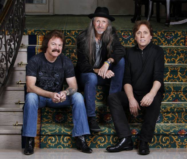 This Sept. 29, 2010 photo shows three members of The Doobie Brothers, from left, Tom Johnston, Pat Simmons, and John McFee, in Nashville, Tenn.