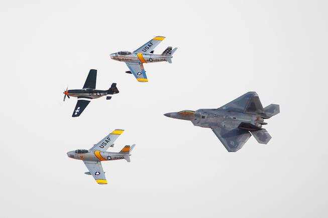 Representing 70 years of military aviation, a P-51 Mustang, left, ...