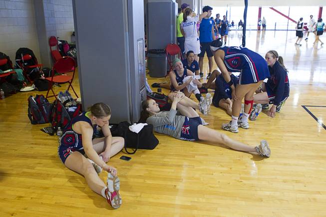 Members of Team USA stretch out in preparation for their next game during the 2012 CallidusCloud U.S. Open Netball Championships at UNLV campus Sunday, November 11, 2012.