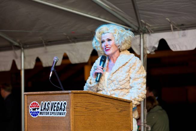 Jayne Post, from Marriage Can Be Murder, hosts the ceremonial opening of the Glittering Lights show at Las Vegas Motor Speedway, Thursday, Nov. 15, 2012.