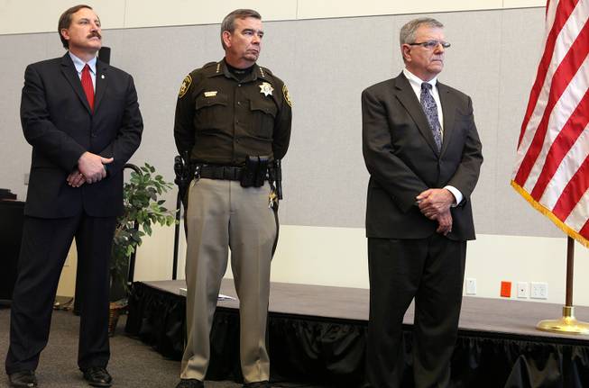 Nevada U.S. Attorney Daniel Bogden, form left, Sheriff Doug Gillespie and Bernard Melekian, the director of the U.S. Department of Justice Office of Community Oriented Policing Services listen during a press conference held by the U.S. Department of Justice Office of Community Oriented Policing Services at the Lloyd George Federal Building in Las Vegas on Thursday, November 15, 2012. The press conference was regarding an eight-month review of Las Vegas Metropolitan Police Department's use of force policies and practices.