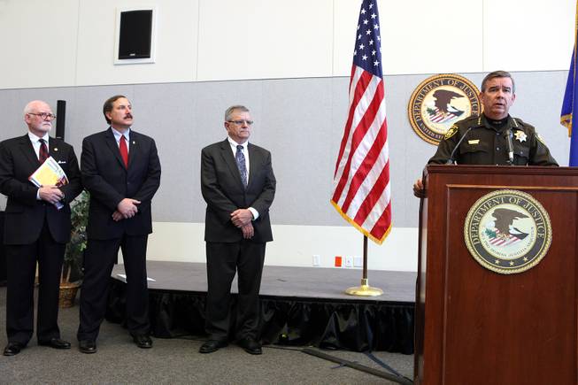 Sheriff Doug Gillespie, right, speaks during a press conference held by the U.S. Department of Justice Office of Community Oriented Policing Services at the Lloyd George Federal Building in Las Vegas on Thursday, November 15, 2012. The press conference was regarding an eight-month review of Las Vegas Metropolitan Police Department's use of force policies and practices. From left is James "Chips" Stewart, a senior fellow of public safety at CNA Analysis & Solutions, Nevada U.S. Attorney Daniel Bogden and Bernard Melekian, the director of the U.S. Department of Justice Office of Community Oriented Policing Services.