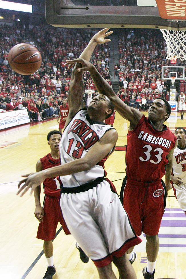 UNLV guard Bryce Dejean-Jones gets fouled by Jacksonville State forward Nick Cook during their game Saturday, Nov. 17, 2012 at the Thomas & Mack. UNLV won 77-58.