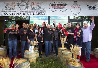 Members of the Las Vegas Distillery, the Booze Brothers Beverage distribution company and the Half Full Artisan Shop at the Distillery celebrate during the Historic First Edition Day at the Las Vegas Distillery in Henderson Saturday, November 17, 2012. The event marks the first bottling of several new spirits and the grand opening of the the distribution company and the retail store. The spirits include Nevada vodka, whiskey, gin, rum and moonshine.