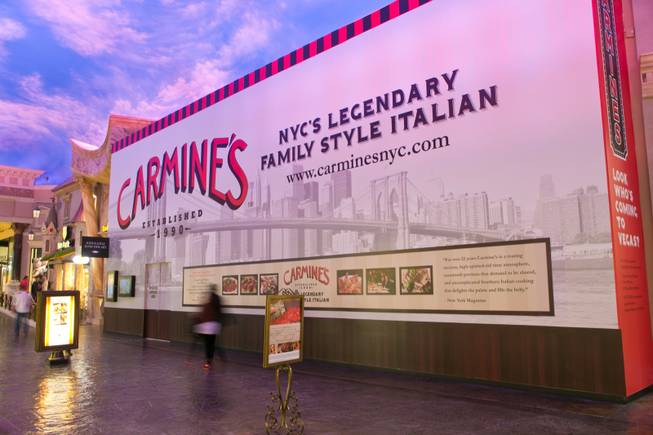 A construction wall inside the Forum Shops at Caesars Palace advertises the future Las Vegas arrival of Carmine's restaurant, Thursday, Nov. 15, 2012.
