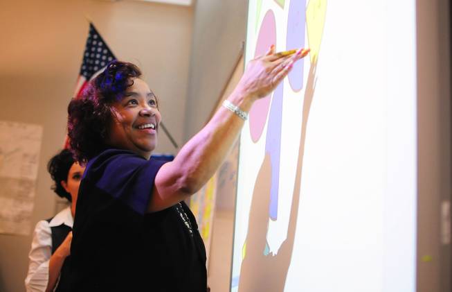 Fitzgerald Elementary School fifth-grade teacher Danita Britt participates in a summer training session. The Clark County School District is trying to increase the number of teachers of color, such as Britt, to lessen its "teacher diversity gap."