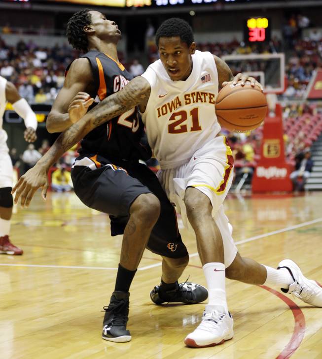 Iowa State guard Will Clyburn, right, tries to drive to the basket against Campbell on Nov. 18, 2012, in Ames, Iowa. Clyburn, who played one season in Utah before transferring to the Cyclones, leads the team in points and rebounds.