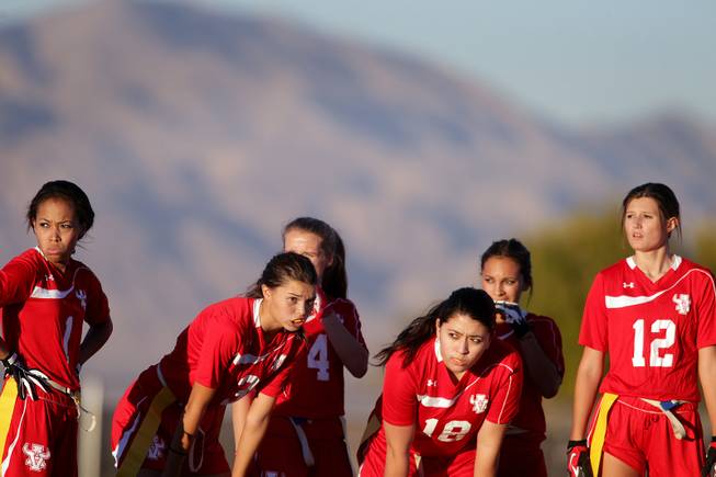 The Arbor View girls flag football team huddles between plays during their game at Cimarron-Memorial High School on Monday, November 26, 2012.