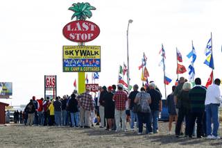 As the jackpot in the multi-state Powerball lottery passes $500 million, hopeful ticket buyers queue up outside the Arizona Last Stop in White Hills, Ariz. Tuesday, Nov. 27, 2012.