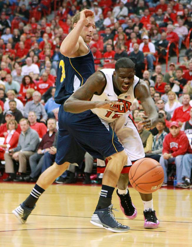 UNLV forward Anthony Bennett is fouled by UC Irvine forward Adam Folker during their game Wednesday, Nov. 28, 2012 at the Thomas & Mack. UNLV won the game 85-57.