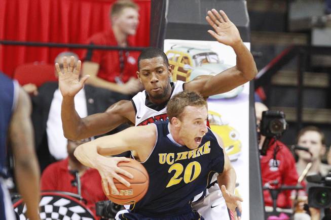 UNLV forward Mike Moser guards UC Irvine forward Adam Folker during their game Wednesday, Nov. 28, 2012 at the Thomas & Mack. UNLV won the game 85-57.