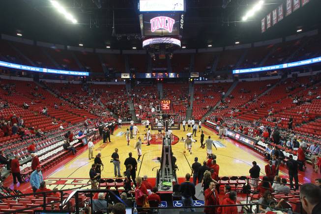 The UNLV Runnin' Rebels and UC Irvine Anteaters basketball teams warm up while fans trickle in before their game Wednesday, Nov. 28, 2012 at the Thomas & Mack. 