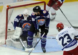 Solar Bears forward Rob Mignardi deflects a Judd Blackwater shot away from the net before it reaches goaltender John Curry as Las Vegas hosted Orlando for the first time in franchise history on Friday night.