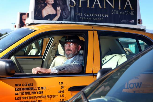 Cab driver George Allen sits in a cab at the Yellow-Checker-Star headquarters in Las Vegas on Tuesday, November 20, 2012.