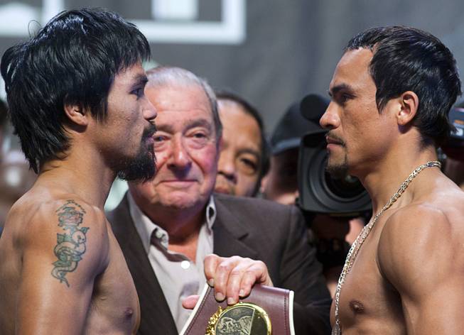 Pacquiao and Marquez Weigh In for 4th Fight