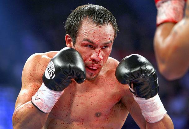 Juan Manuel Marquez of Mexico bleeds from a cut on his face during his welterweight fight against Manny Pacquiao of the Philippines at the MGM Grand Garden Arena in Las Vegas, Nevada December 8, 2012.