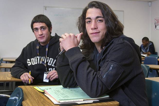 Twins Aarik, left, and Aalik Poeling pose in their English class at Desert Rose Adult High School in North Las Vegas on Monday, Dec. 11, 2012. Aarik was kicked out of four CCSD schools for fighting, while Aalik dropped out his freshman year and began selling drugs. The brothers, now 18 years old, are trying to get their lives in order and graduate high school.