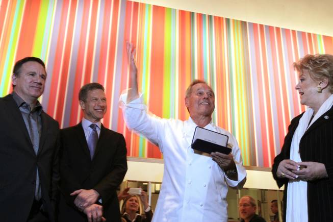 Wolfgang Puck receives the key to the city from Las Vegas Mayor Carolyn Goodman to celebrate the 20th anniversary of Spago Las Vegas inside The Forum Shops at Caesars on Tuesday, December 11, 2012.