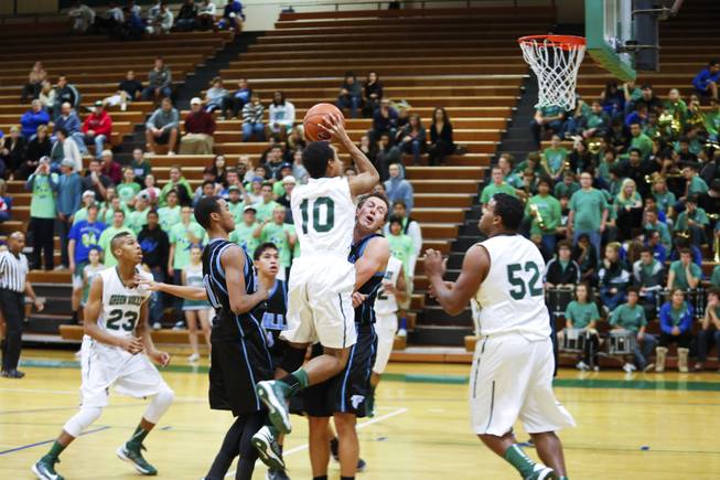 Trey Austin, number 10 Green Valley, attempts to score against Foothill, Wednesday, Dec. 12, 2012. Foothill beats Green Valley 68-51.