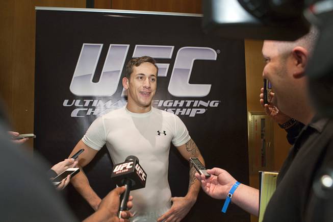 Welterweight fighter Mike Ricci tale with reporters during UFC Ultimate Fighter Finale workouts at the Hard Rock Thursday, Dec. 13, 2012.