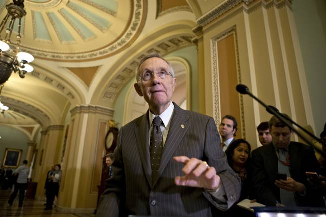 Senate Majority Leader Harry Reid, D-Nev., speaks with reporters following a Democratic strategy session at the Capitol in Washington, Tuesday, Dec. 11, 2012. 