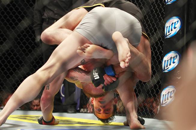 Mike Ricci rides on top of Colton Smith during their bout at "The Ultimate Fighter 16" Saturday, Dec. 15, 2012, at the Joint in the Hard Rock Hotel. Smith won by unanimous decision.