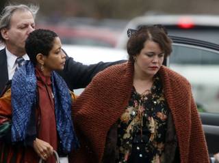 Veronika Pozner, right, arrives at a funeral service for her son, 6-year-old Noah Pozner, Monday, Dec. 17, 2012, in Fairfield, Conn. Pozner was killed when Adam Lanza walked into Sandy Hook Elementary School in Newtown on Friday and opened fire, killing 26 people, including 20 children.