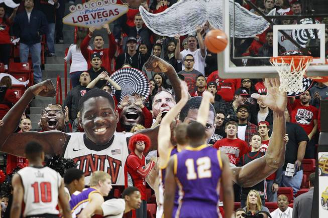 The UNLV student section "The Rebellion" tries to distract a UNI free throw shooter during their game Wednesday, Dec. 19, 2012 at the Thomas & Mack. UNLV won 73-59 to push their record to 10-1.