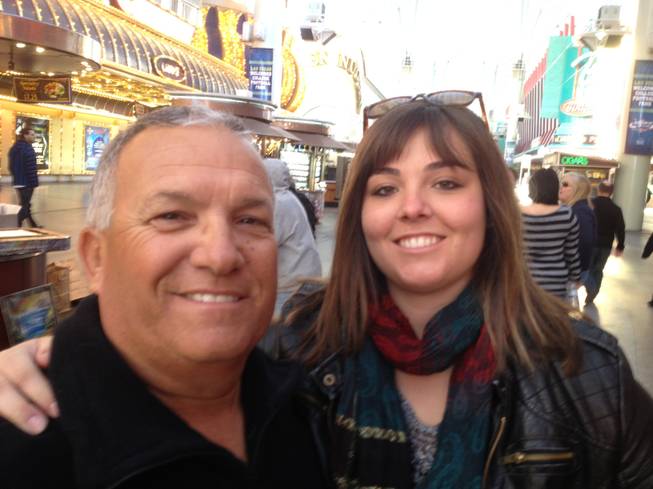 Steve Staley (left) and his daughter Ashley were interviewed about the supposed Mayan Apocalypse on Dec. 20, 2012, on Fremont Street in downtown Las Vegas.
