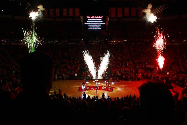 Christmas colored fireworks explode in the Thomas & Mack as part of the pre game before the UNLV game against Canisius Saturday, Dec. 22, 2012. The Runnin' Rebels won 89-74.