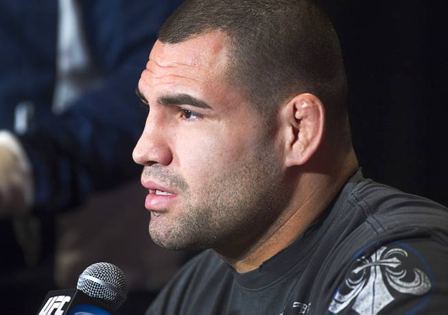Former UFC heavyweight champion Cain Velasquez of San Jose, Calif. responds to a question during a news conference at the MGM Grand Thursday, Dec. 27, 2012. Velasquez will try and reclaim his title from heavyweight champion Junior Dos Santos of Brazil during UFC155 at the MGM Grand Garden Arena Saturday.