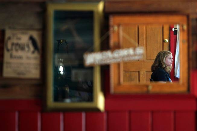 Las Vegas Weekly writer Kristen Peterson is reflected in a mirror at the Crow Bar in Shoshone, Calif.