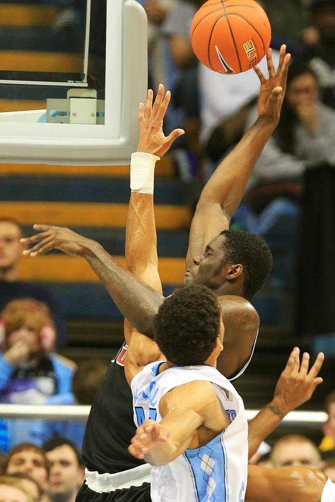 UNLV forward Anthony Bennett is fouled by North Carolina forward James Michael McAdoo during their game Saturday, Dec. 29, 2012 at the Dean Smith Center in Chapel Hill, N.C.