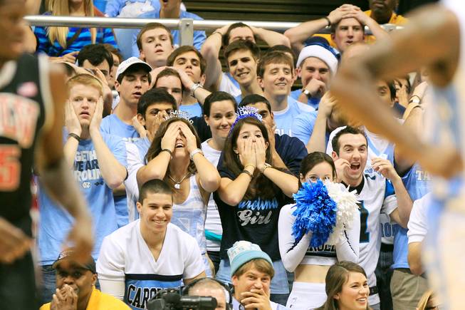 North Carolina fans react after one of their players was called for a foul during their game against UNLV Saturday, Dec. 29, 2012 at the Dean Smith Center in Chapel Hill, N.C. North Carolina won the game 79-73.