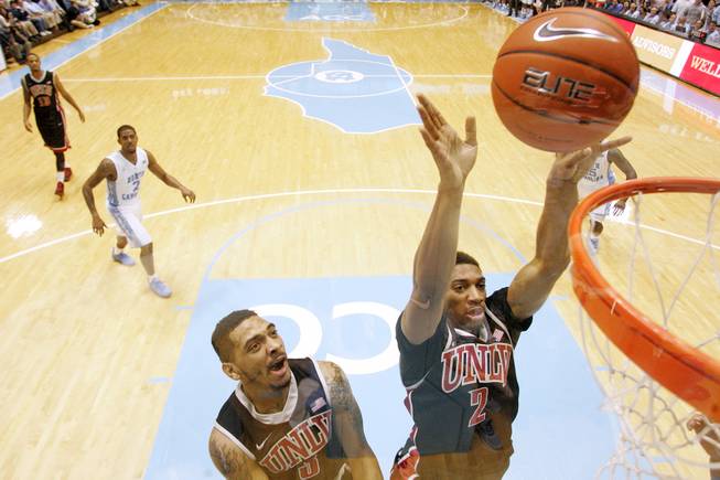 UNLV forward Khem Birch throws in a put back agasint North Carolina during their game Saturday, Dec. 29, 2012 at the Dean Smith Center in Chapel Hill, N.C. North Carolina won the game 79-73.