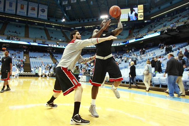 UNLV forward Carlos Lopez-Sosa and Anthony Bennett warm up before their game against North Carolina Saturday, Dec. 29, 2012 at the Dean Smith Center in Chapel Hill, N.C.