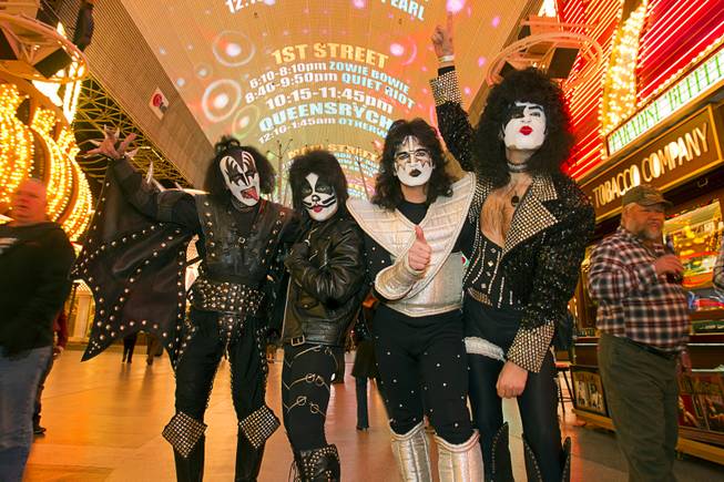 KISS impersonators pose before getting kicked out of the New Year's Eve party at Fremont Street Experience on Monday, Dec. 31, 2012. Heavy makeup and masks were not being allowed at the party, a security officer said. From left: Gary Downe, Troy Lynn, Zenon Skyy and Gary Stevens.