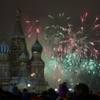 Fireworks explode in the sky over St. Basil Cathedral as Russians celebrate New Year on Red Square in Moscow, Russia, on Tuesday, Jan. 1, 2013. 