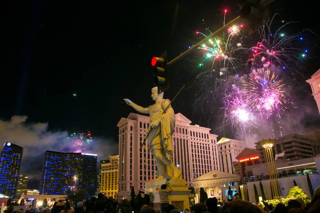 Fireworks fill the sky during the midnight New Year's Eve celebration on The Strip, Monday, Dec. 31, 2012.