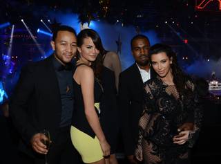 John Legend, Chrissy Teigen, Kanye West and Kim Kardashian celebrate New Year's Eve at 1OAK in the Mirage on Monday, Dec. 31, 2012.

