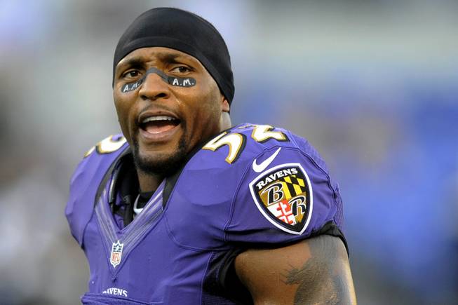 Baltimore Ravens linebacker Ray Lewis is shown wearing eye black with the initials of former Ravens owner Art Modell before an NFL football game against the Cincinnati Bengals in Baltimore, Sept. 10, 2012.