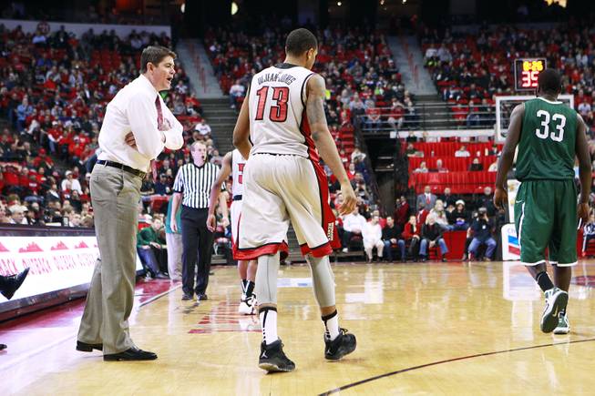 After turing the ball over on a no-look pass, UNLV guard Bryce Dejean-Jones gets an earful from coach Dave Rice during their game against Chicago State Thursday, Jan. 3, 2013 at the Thomas & Mack Center. UNLV won the game 74-52.