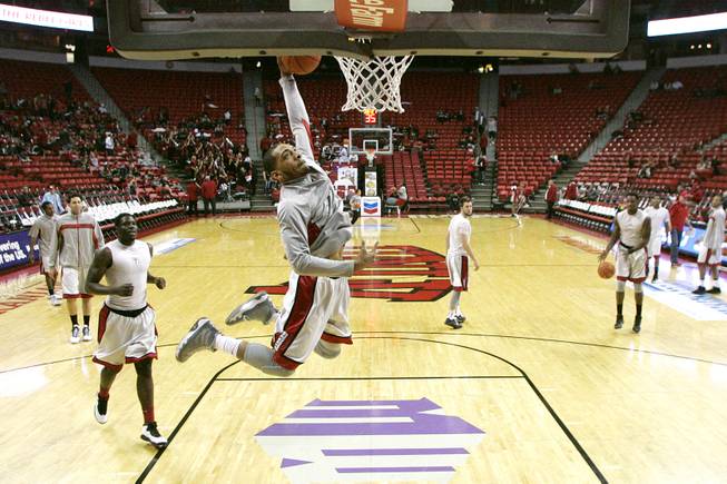 UNLV guard Anthony Marshall warms up with the rest of the Runnin' Rebels before their game against Chicago State Thursday, Jan. 3, 2013 at the Thomas & Mack Center.