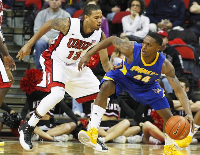 UNLV guard Bryce Dejean-Jones defends Cal State Bakersfield guard Stephon Carter during their game Saturday, Jan. 5, 2013, at the Thomas & Mack Center. UNLV won their non-conference finale 84-63.