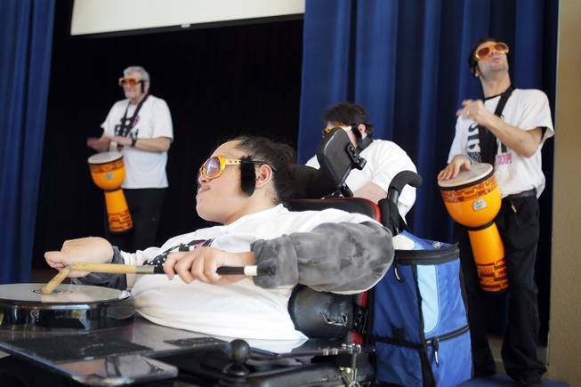 Jason Hanson of the Roaring Thunder percussion team performs during a celebration of Elvis Presley's birthday at Opportunity Village Engelstad Campus in Las Vegas on Tuesday, January 8, 2013.