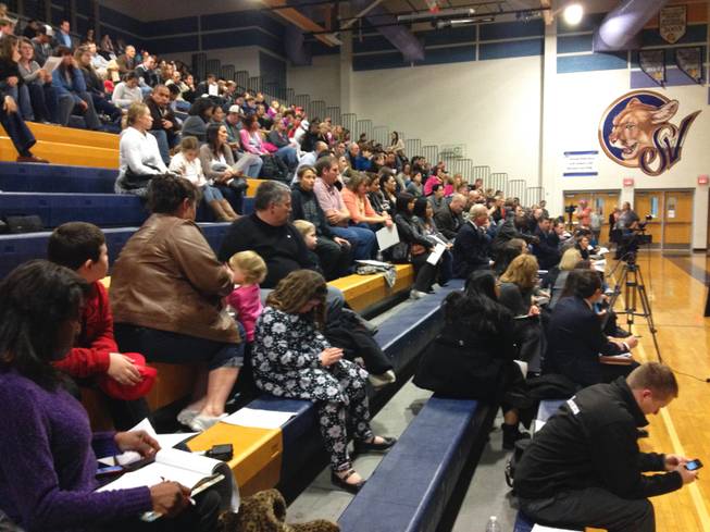 About 250 parents packed the Sierra Vista High School gym on Monday, Jan. 7, 2013, for the Clark County School District's town hall meeting to address school overcrowding. Possible solutions include major rezoning and switching to a year-round calendar. 
