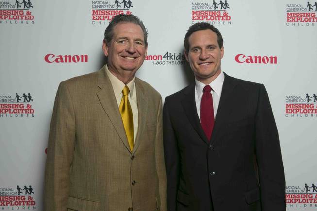 Former Nevada Gov. Bob Miller and Ross Miller arrive at the red carpet for the 2013 Canon USA and National Center for Missing and Exploited Children benefit at the Bellagio on Wednesday, Jan. 9, 2013.