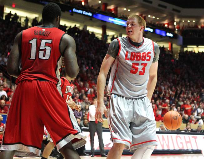 New Mexico's Alex Kirk has words for UNLV forward Anthony Bennett after a dunk during the first half of their game Wednesday, Jan. 9, 2013 at The Pit in Albuquerque. Kirk was whistled for a technical foul for his actions. 